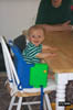 Asten_in_high_chair_7-5-99